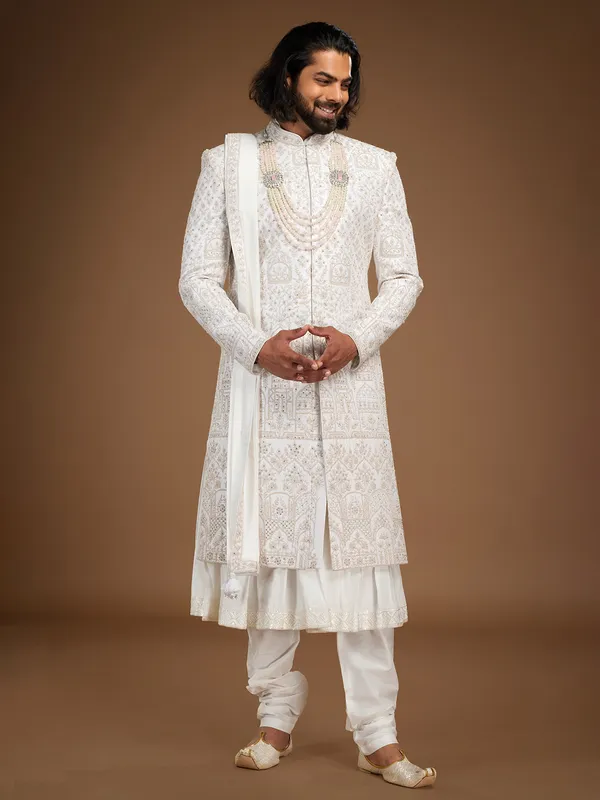 Stunning white silk embroidery sherwani