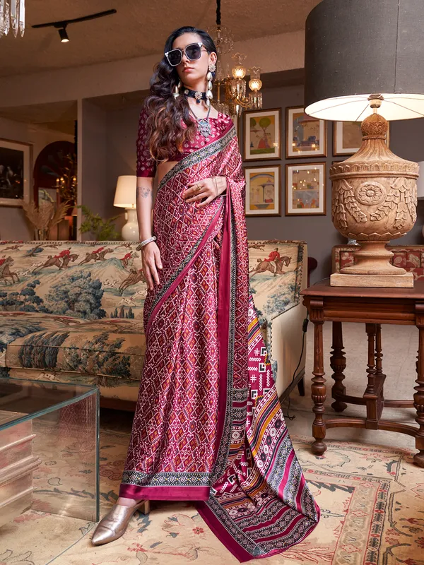 Stunning wine patola printed crepe saree