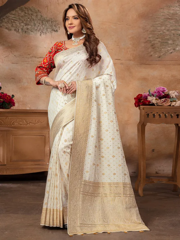 Stylish cream dola silk saree