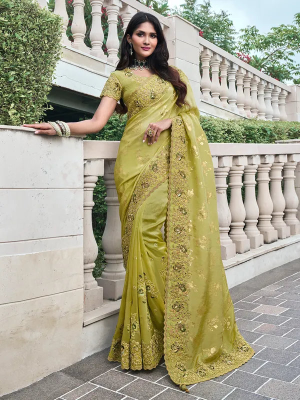 Stylish lemon green tissue silk saree