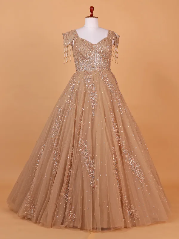Stylish peach net gown for party wear