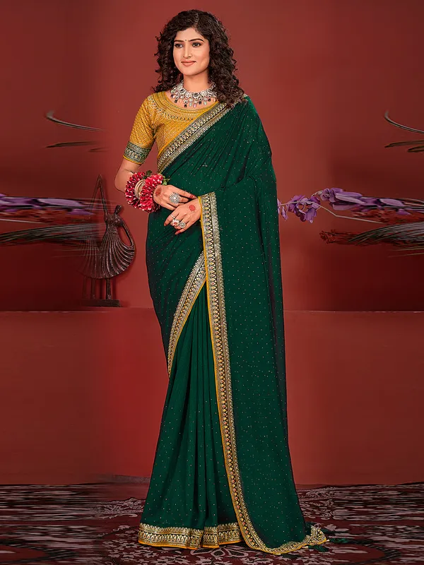 Beautiful green swarovski work silk saree
