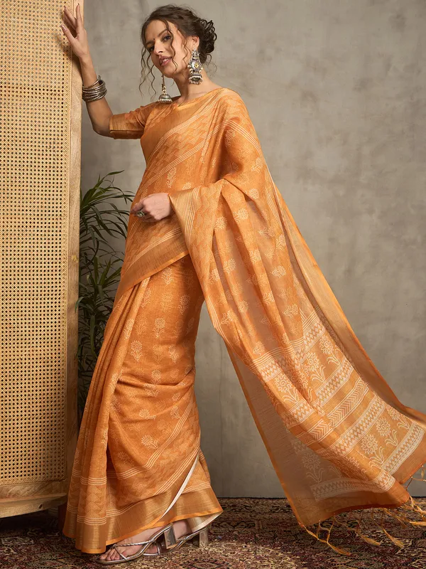 Stylish rust orange pure linen saree with prints
