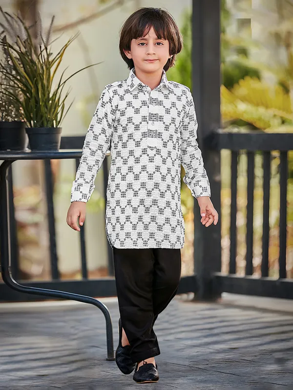 Stylish white and black kurta suit for festive occasions