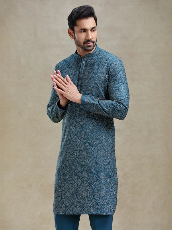 Teal blue kurta set with aabla and embroidery work on yock