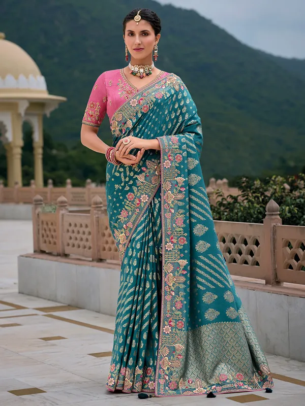 Teal blue silk saree in beautiful work