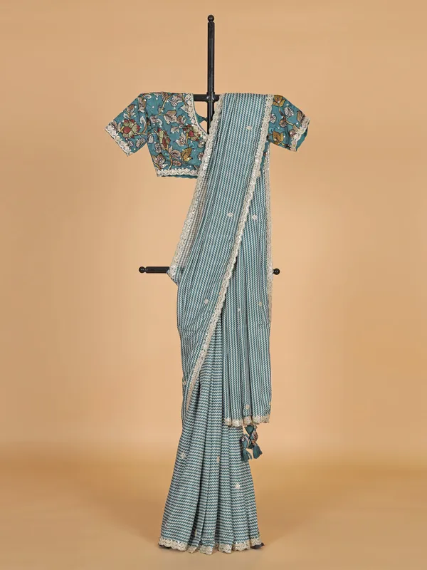 Teal blue zig zag printed saree with ready made