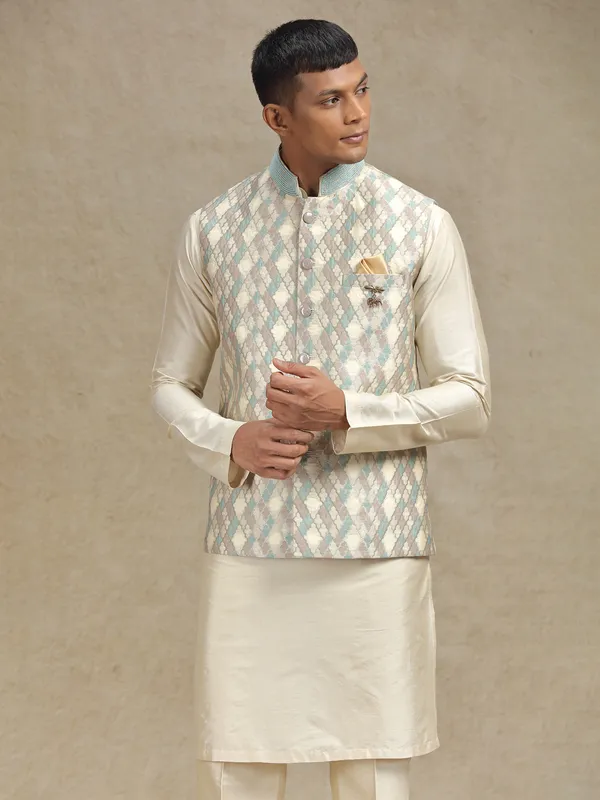 Cream and pista waistcoat set for festive occasions