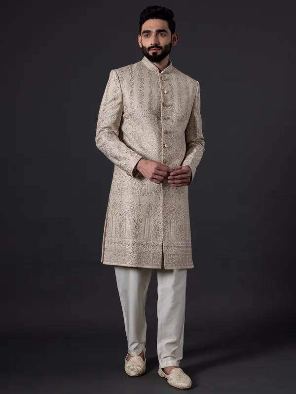 Traditional glimmerish beige silk sherwani for groom