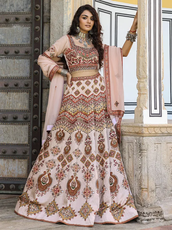 Traditional white and peach silk lehenga choli in print