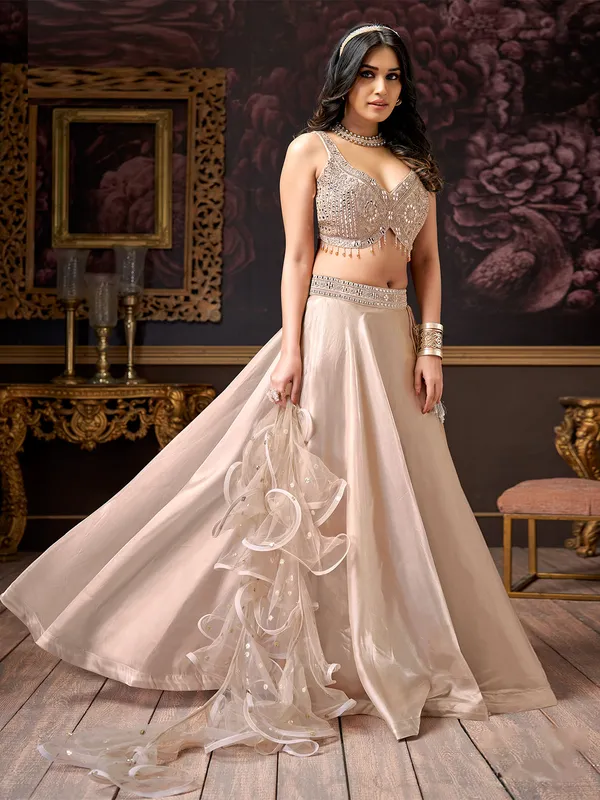Trendy beige lehenga choli with ruffle dupatta