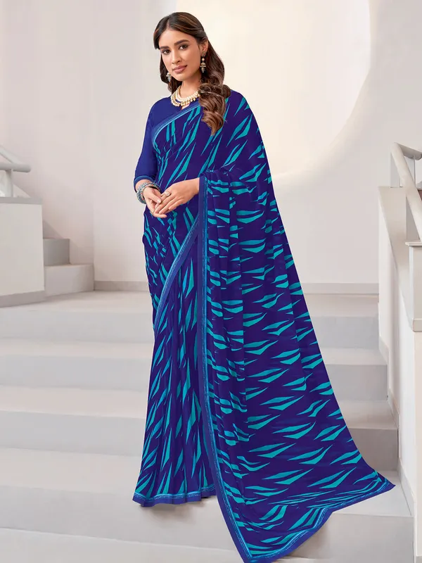 Trendy dark blue printed georgette saree