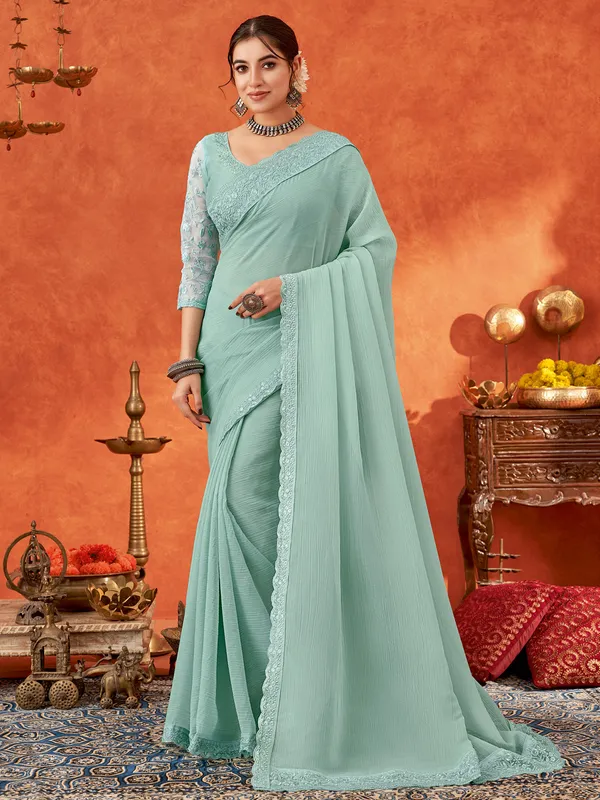 Trendy mint green chiffon saree