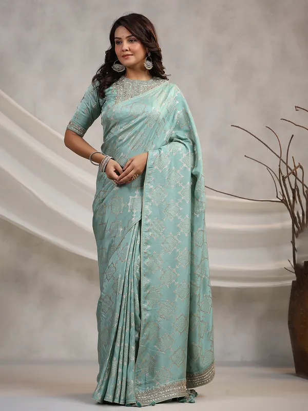 Trendy mint green silk wedding saree