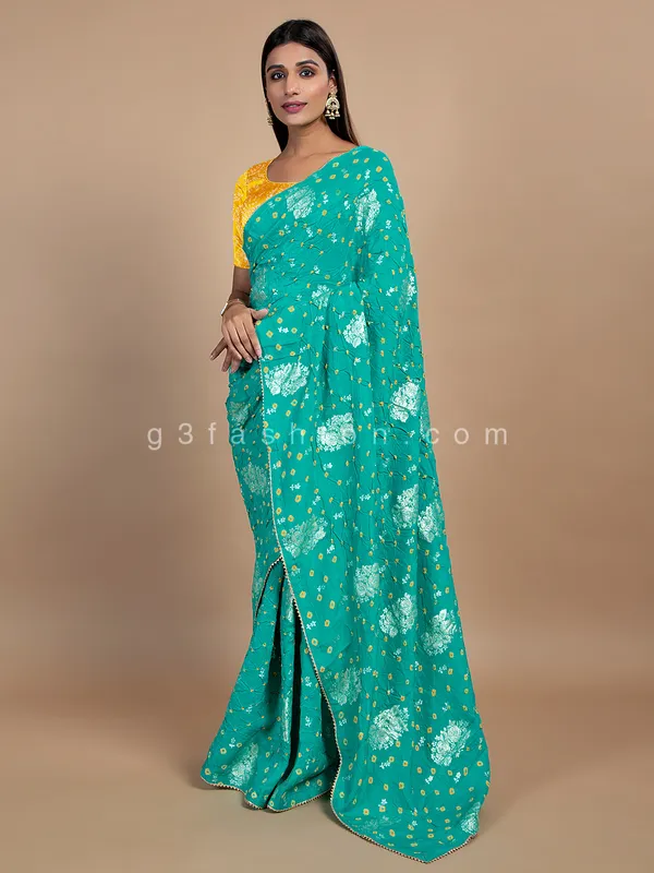 Turquoise green wedding wear bandhej saree