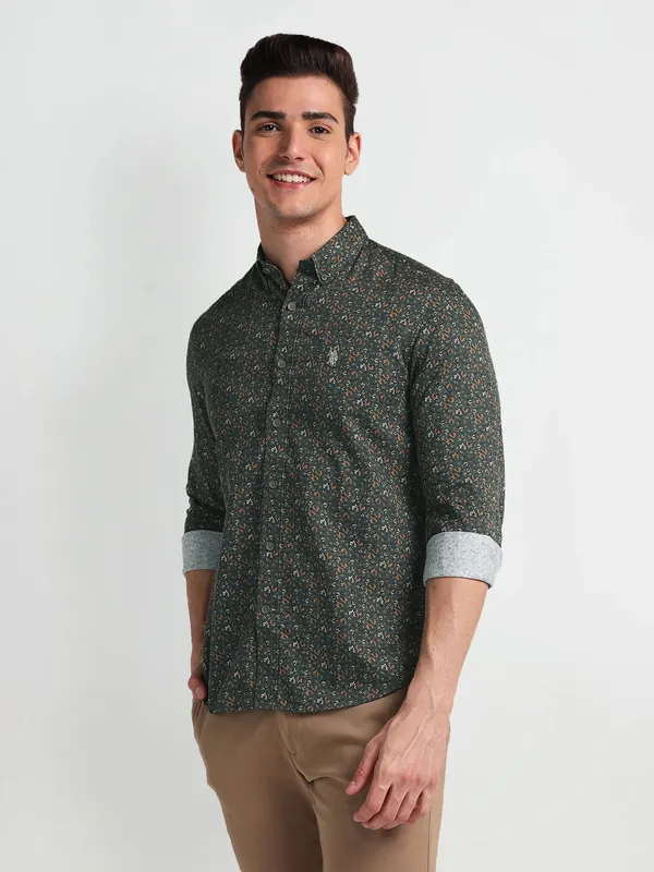 U S POLO ASSN dark green printed shirt