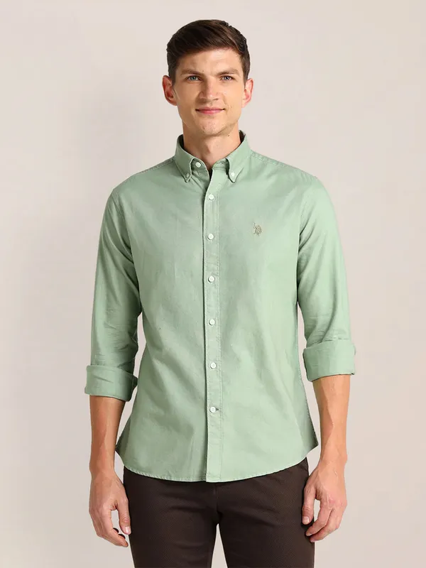 U S POLO ASSN green plain shirt in cotton fabric