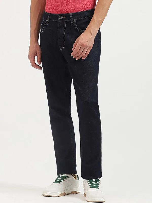 UCB solid black slim tapered denim jeans