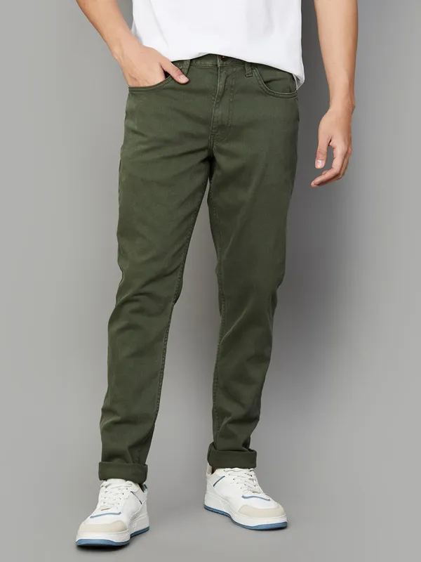 UCB solid olive slim tapered fit denim jeans