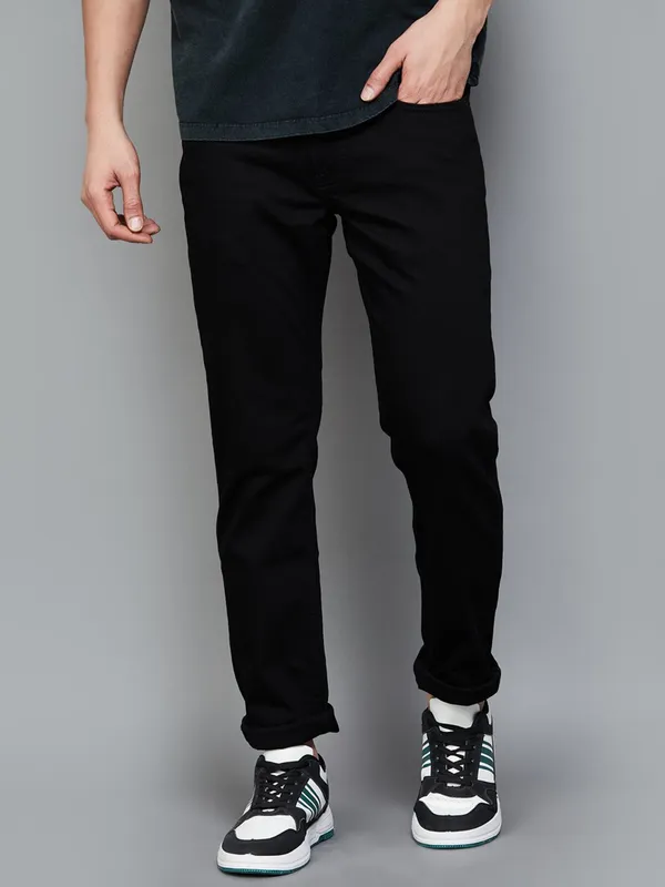 US POLO solid black slim tapered denim jeans for men