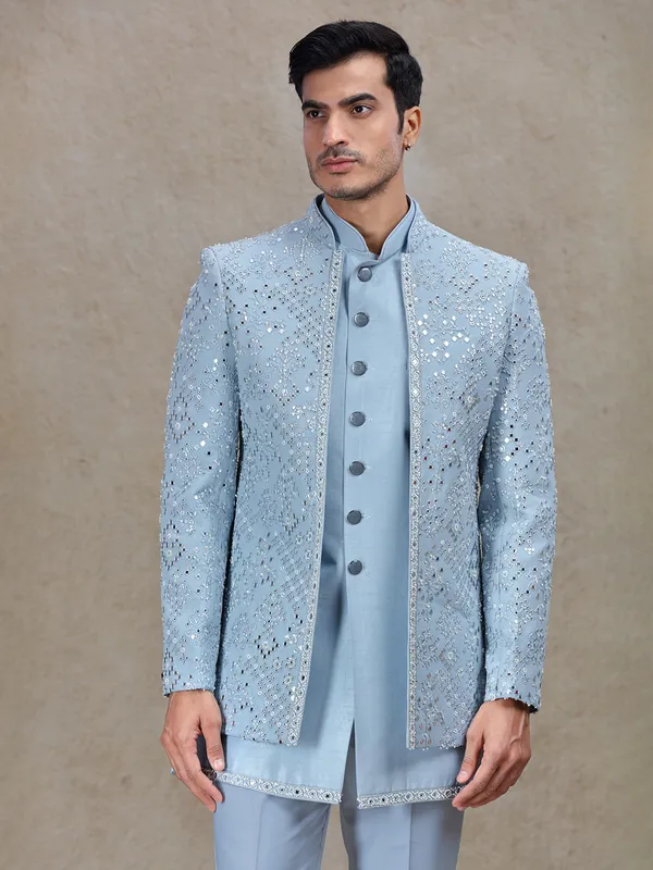 Vibrant light blue indo western for wedding and reception