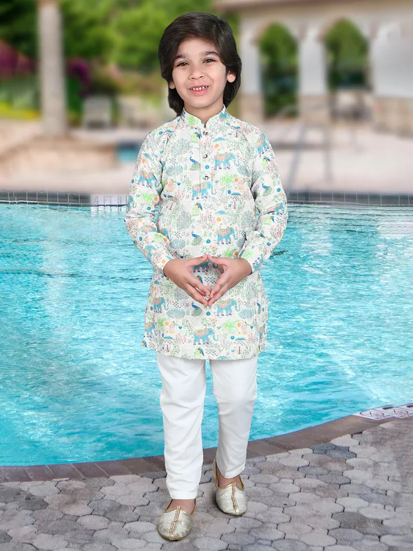 Vibrant off white cotton silk kurta set with resham work