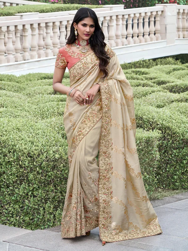 Wedding wear beige tissue silk saree