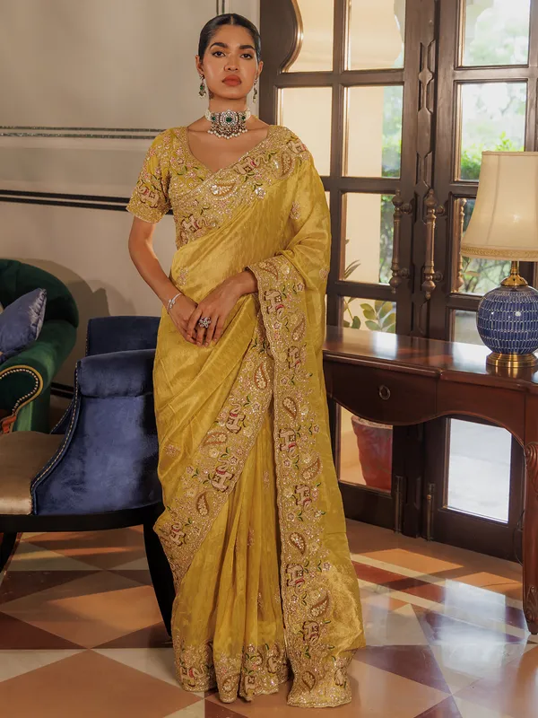 Wedding wear yellow silk saree