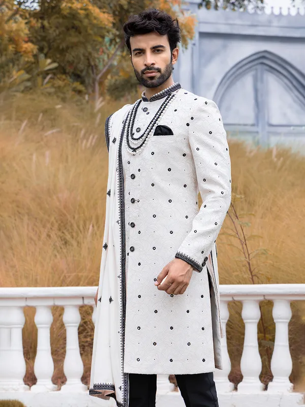 White and black raw silk sherwani for groom