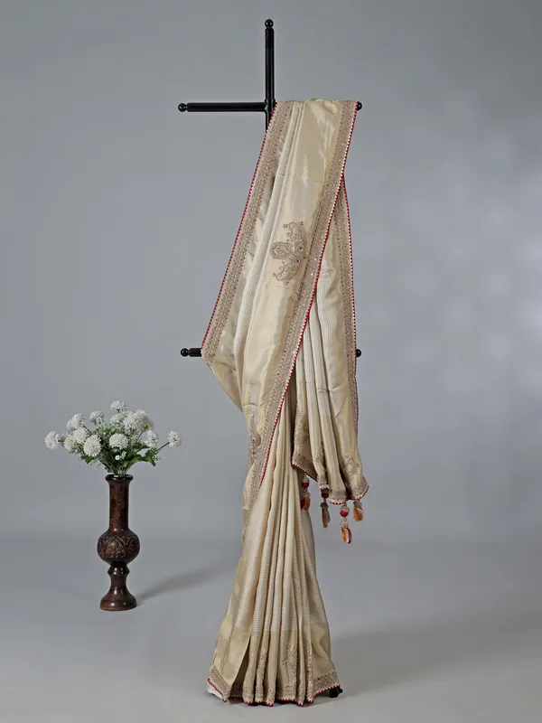 White and gold silk zardosi wedding wear saree