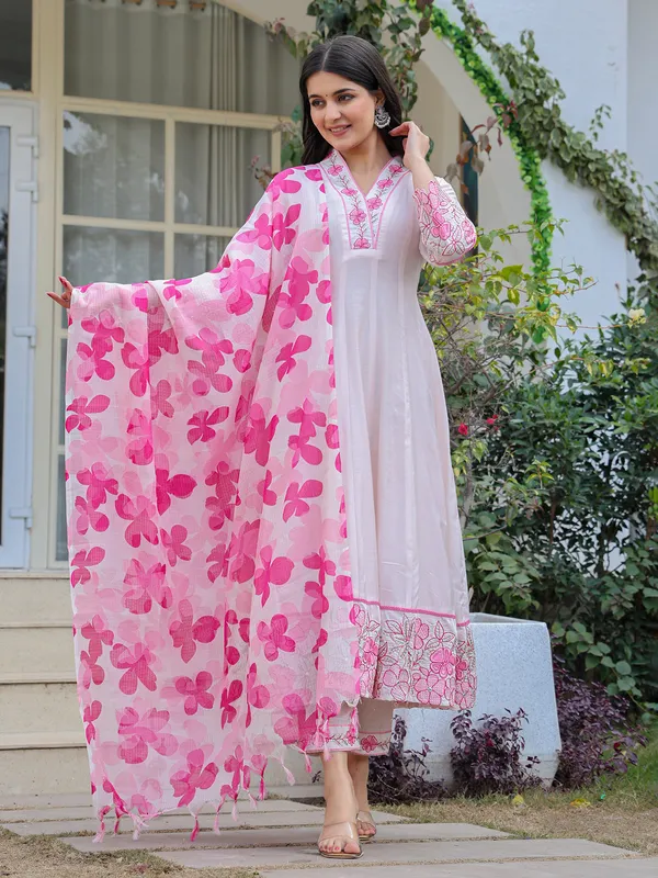 White and pink suit perfect for special celebrations