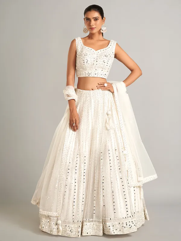 White colored net lehenga choli for wedding
