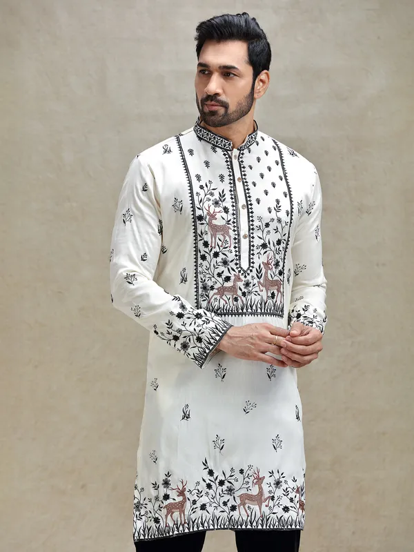 White embroideried kurta pajama set for charming look