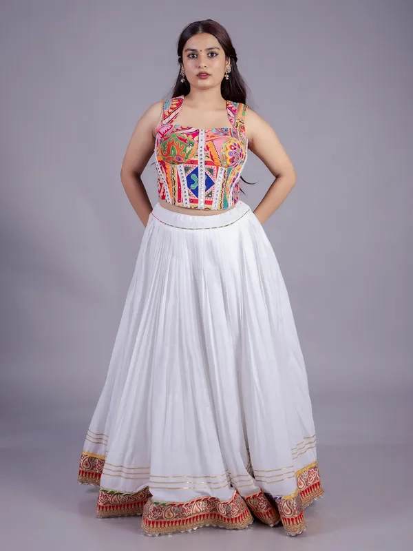 White navratri lehenga choli with embroidered blouse