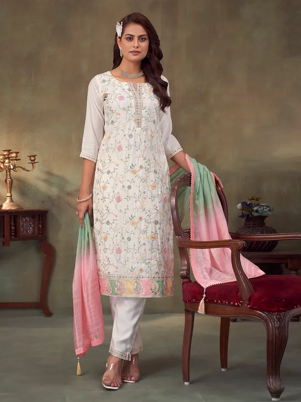 White silk salwar suit with embroidery and dupatta
