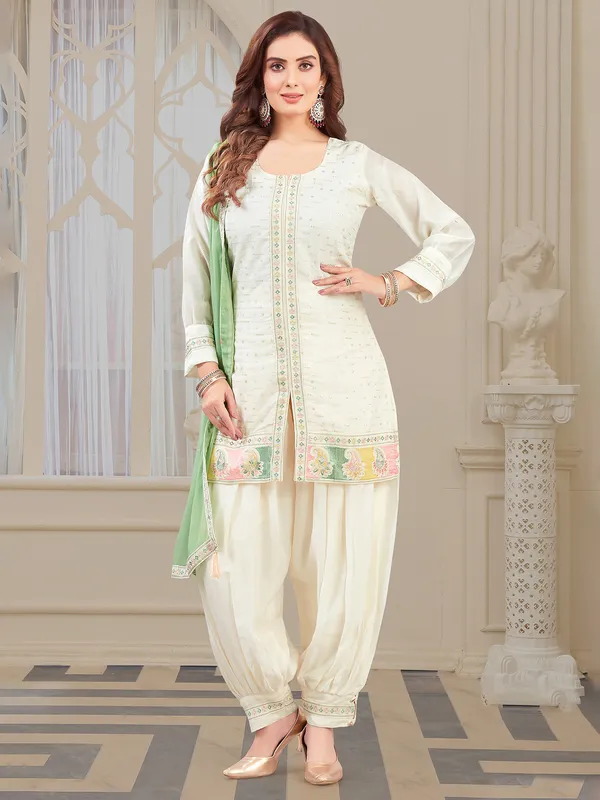White silk salwar suit with sequins work