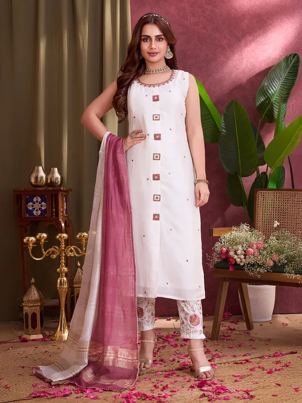White silk salwar suit with shaded dupatta