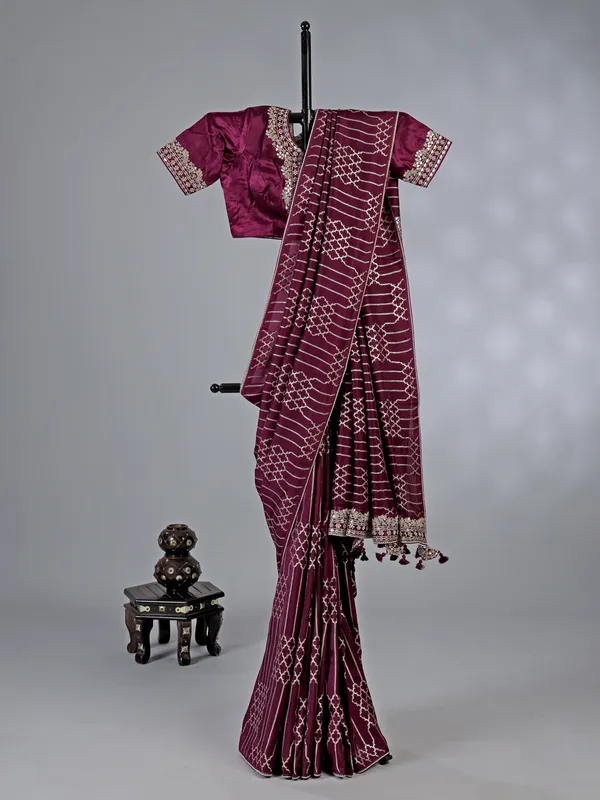 Wine dola silk saree with zari weaving