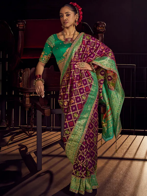 Wine silk saree with rich zari embellishment