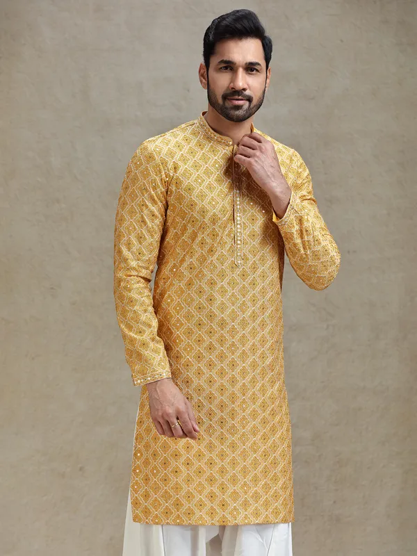 Yellow classic symmetrical embroidery patterned kurta salwar set