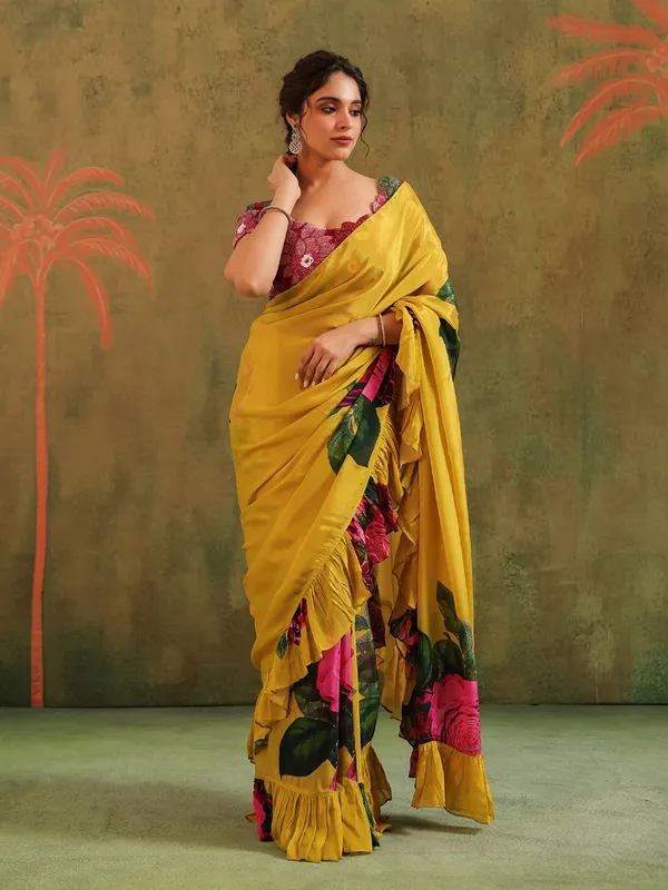 Yellow crepe georgette saree with embellished details