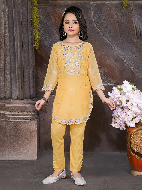 Yellow embroidered cotton silk salwar suit with pants