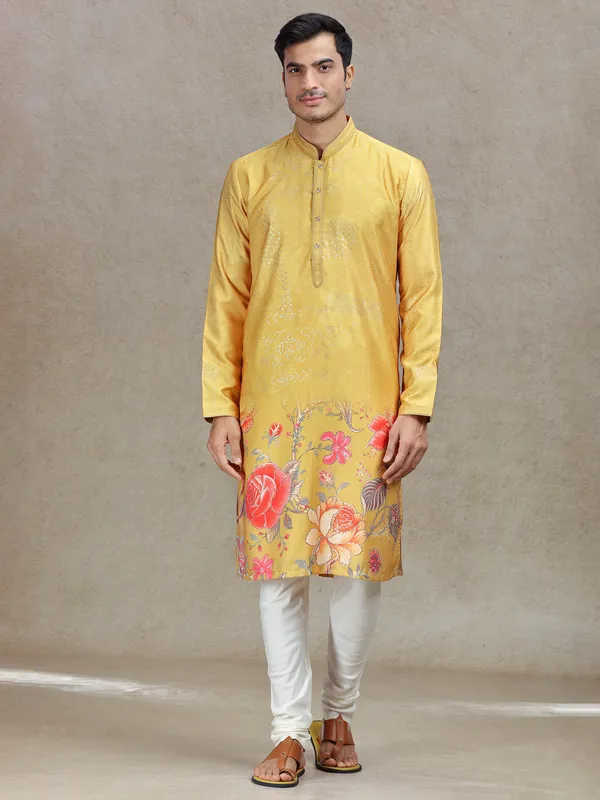 Yellow eye-catching printed kurta suit in tussar silk