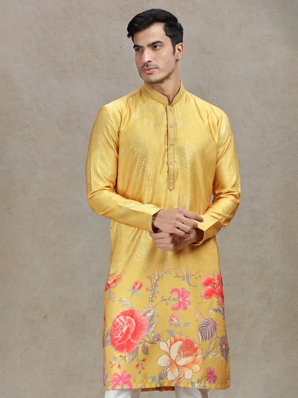 Yellow eye-catching printed kurta suit in tussar silk