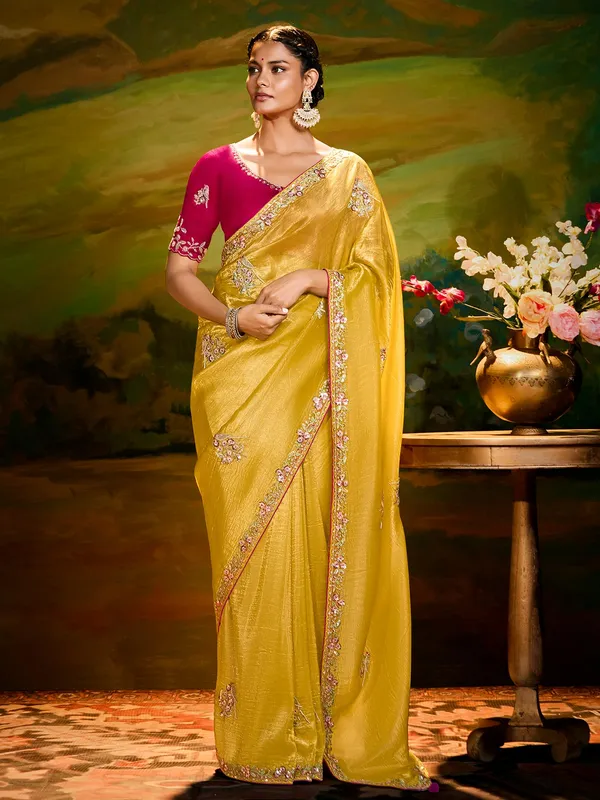 Yellow festive wear saree in tissue silk