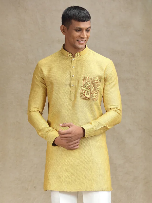 Yellow kurta pajama set in textured embroidery