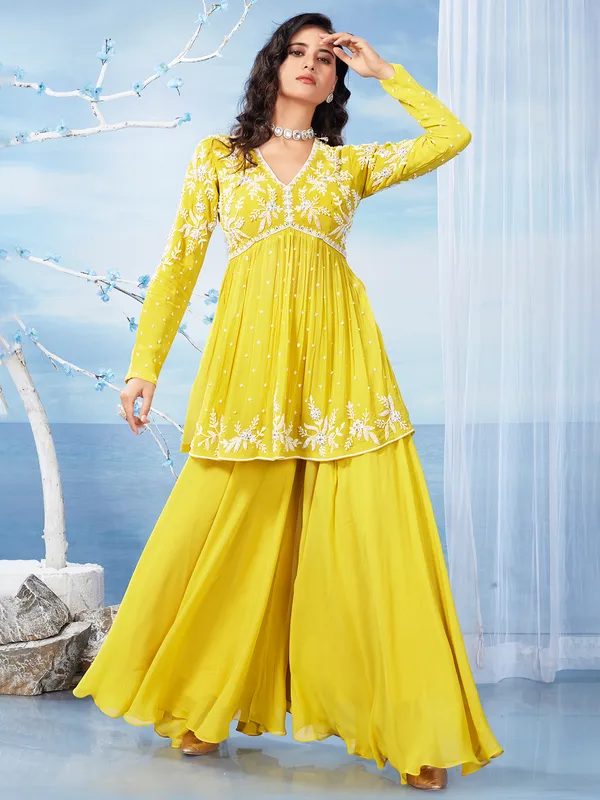 Yellow palazzo salwar suit in georgette for wedding