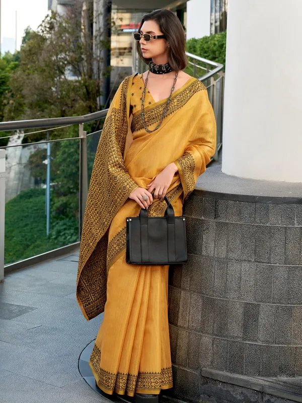 Yellow printed linen tissue silk saree