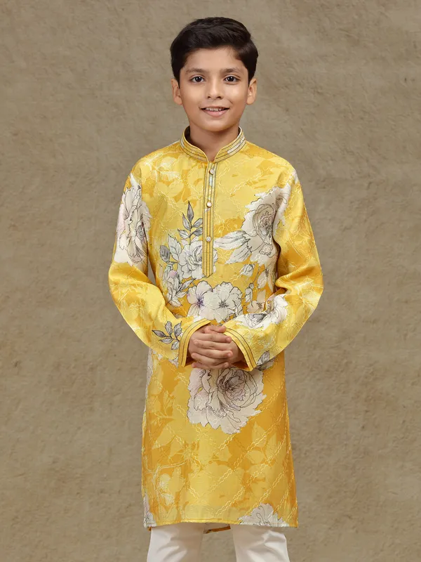 Yellow printed silk kurta suit for festive wear
