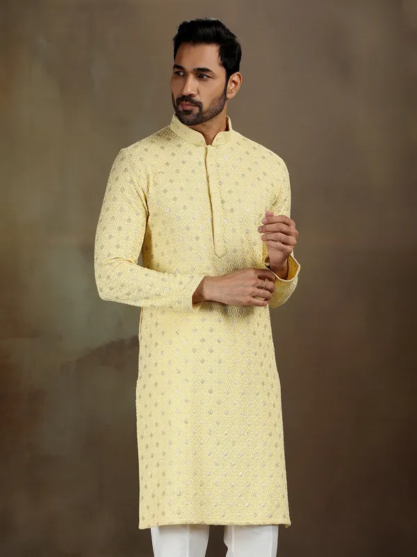 Yellow royan kurta set with subtle shine
